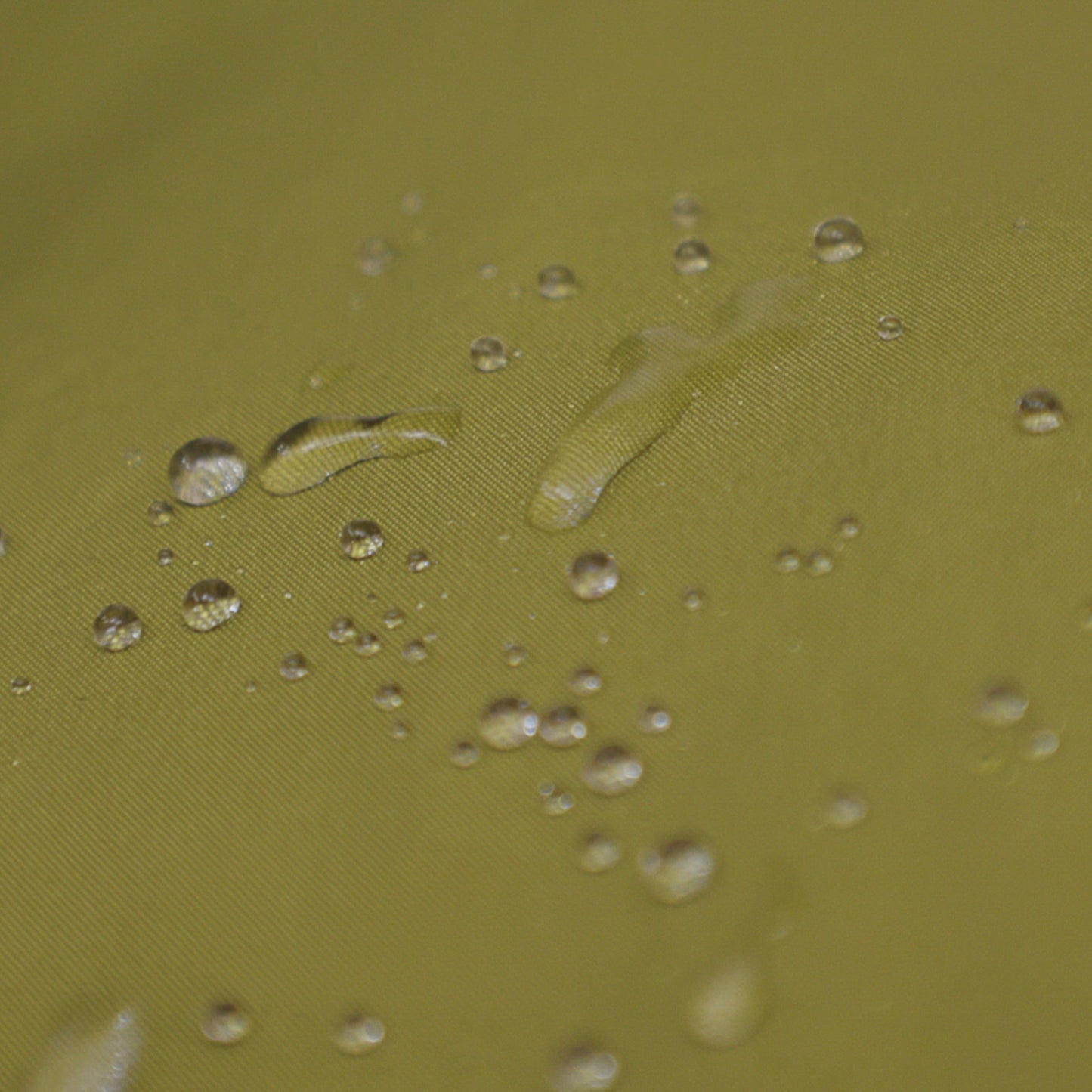 Gear Aid Revivex Wash-In Water Repellent shown in use