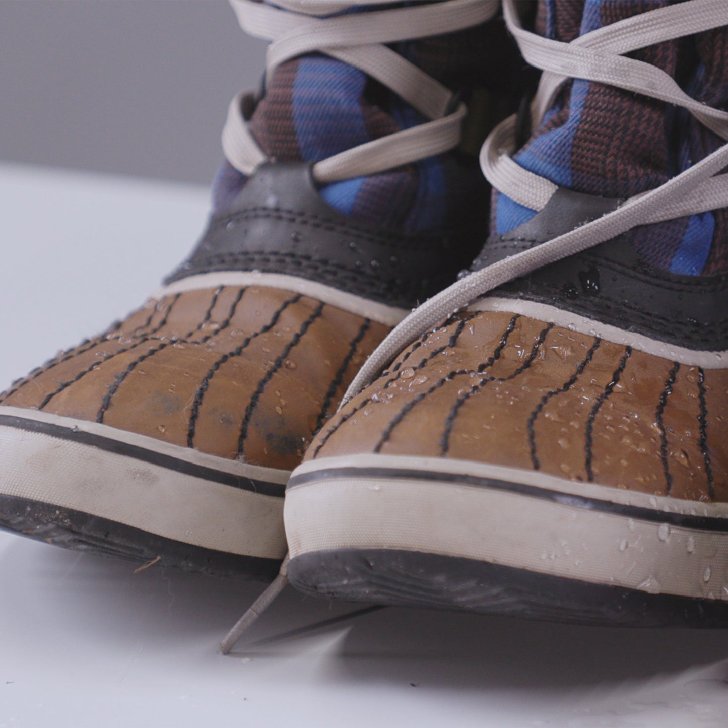 Gear Aid Revivex Suede and Fabric Water Repellent shown in use