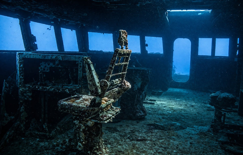 A seat and window openings inside ex-HMAS Canberra