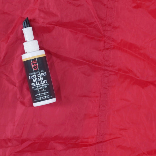 Gear Aid Seam Grip FC Fast Cure Seam Sealant shown in use
