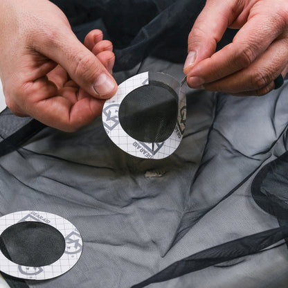 Gear Aid Tenacious Tape Mesh Patches shown in use