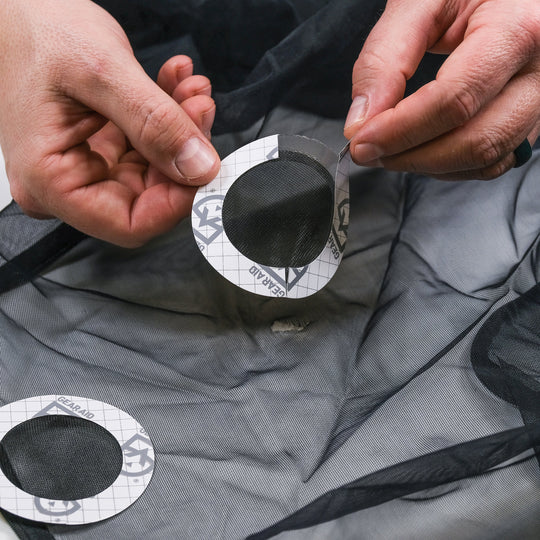 Gear Aid Tenacious Tape Mesh Patches shown in use