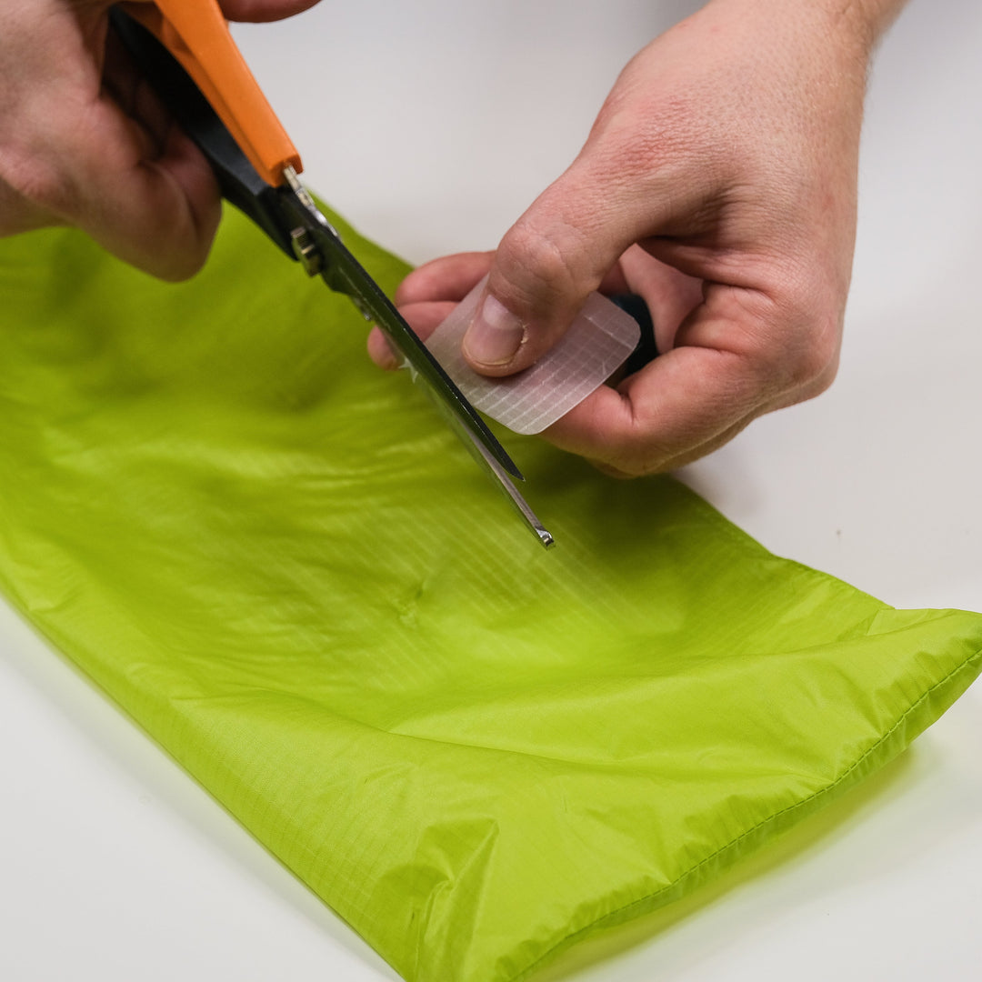 Gear Aid Tenacious Tape Silnylon Patches shown in use