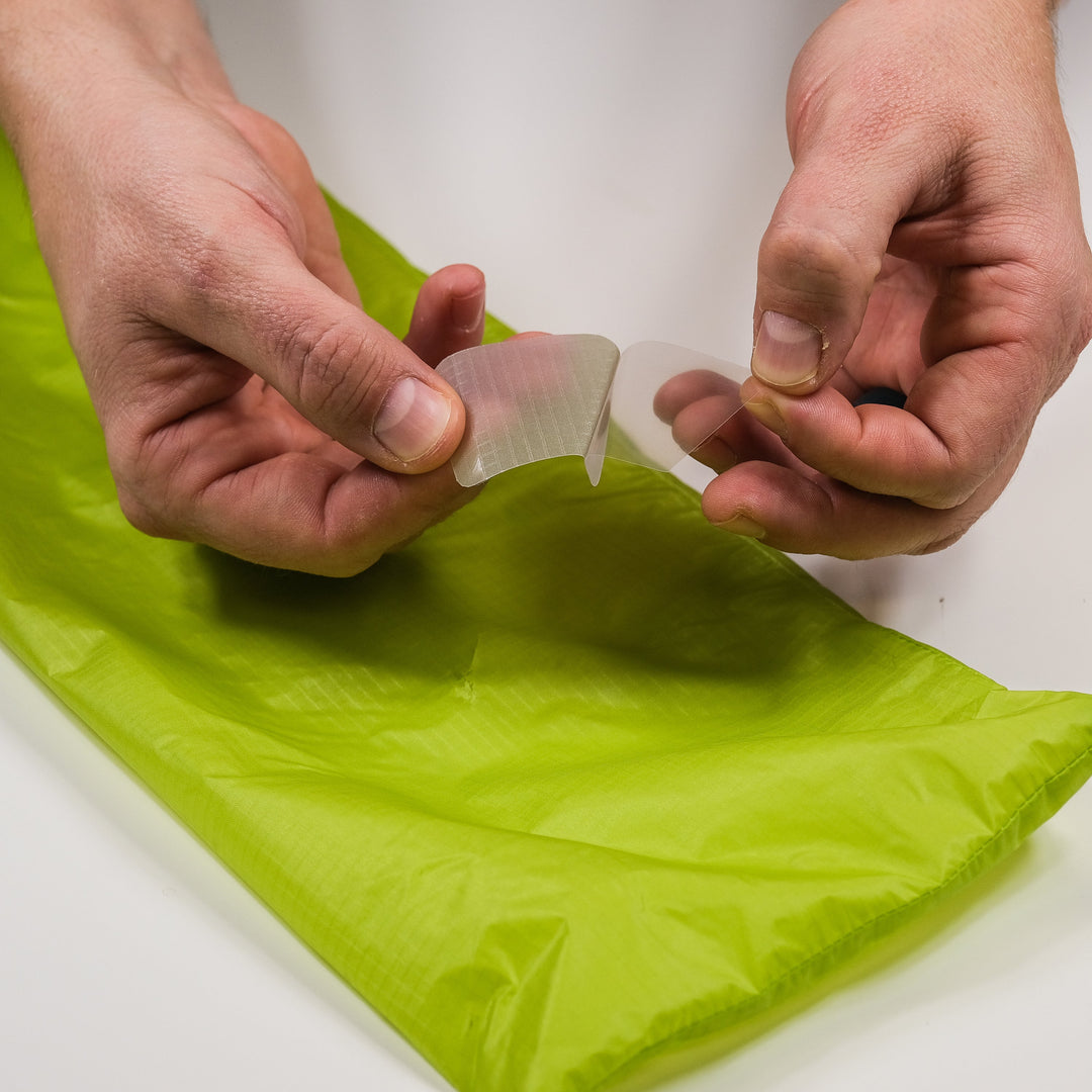 Gear Aid Tenacious Tape Silnylon Patches shown in use
