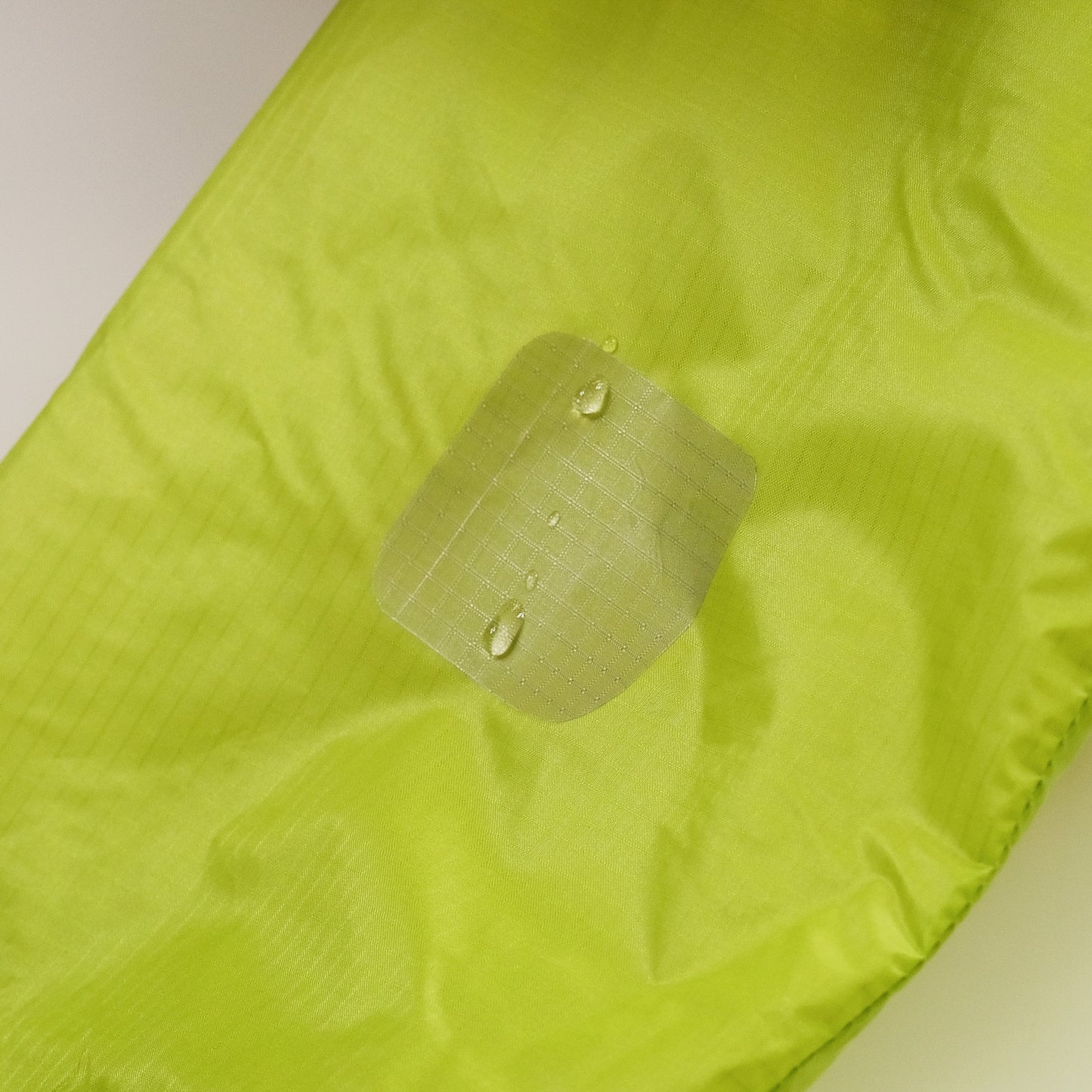 Gear Aid Tenacious Tape Silnylon Patches shown in use