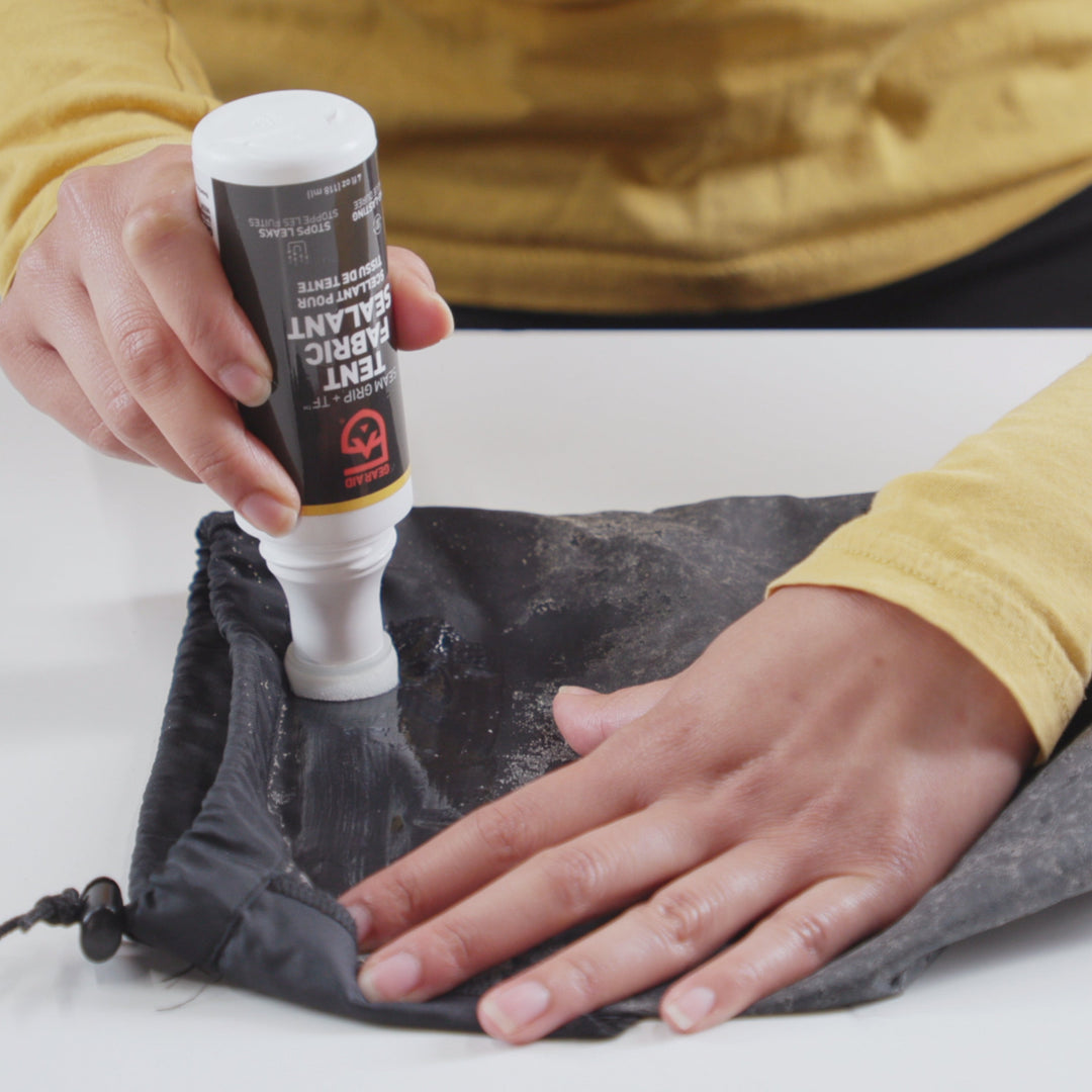 Gear Aid Seam Grip TF Tent Fabric Sealant shown in use