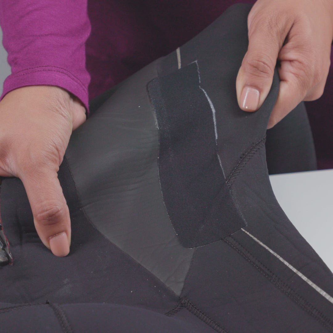 Gear Aid Tenacious Tape Iron-On Neoprene Patch shown in use