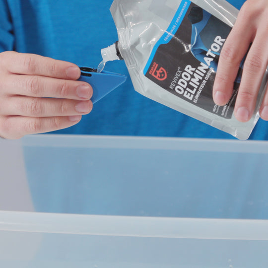 Gear Aid Revivex Odor Eliminator shown in use
