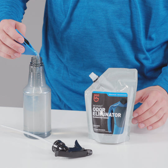 Gear Aid Revivex Odor Eliminator shown in use