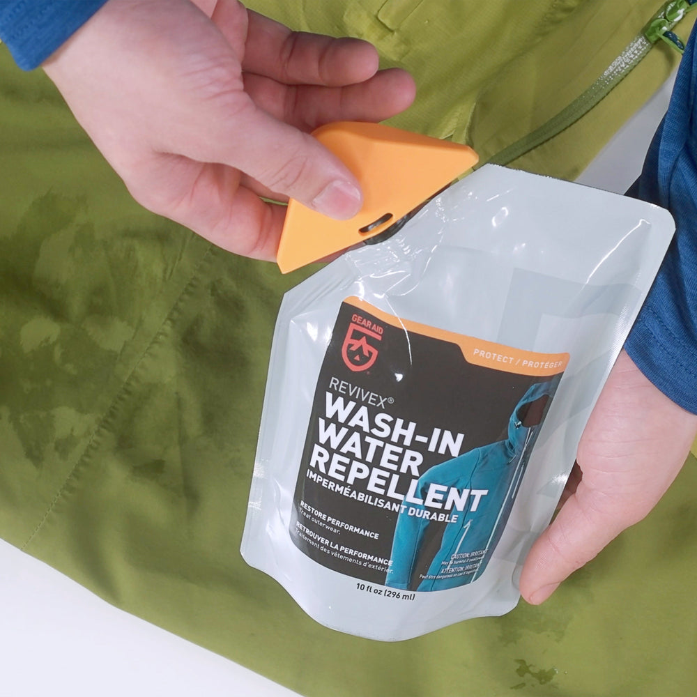 Gear Aid Revivex Wash-In Water Repellent shown in use