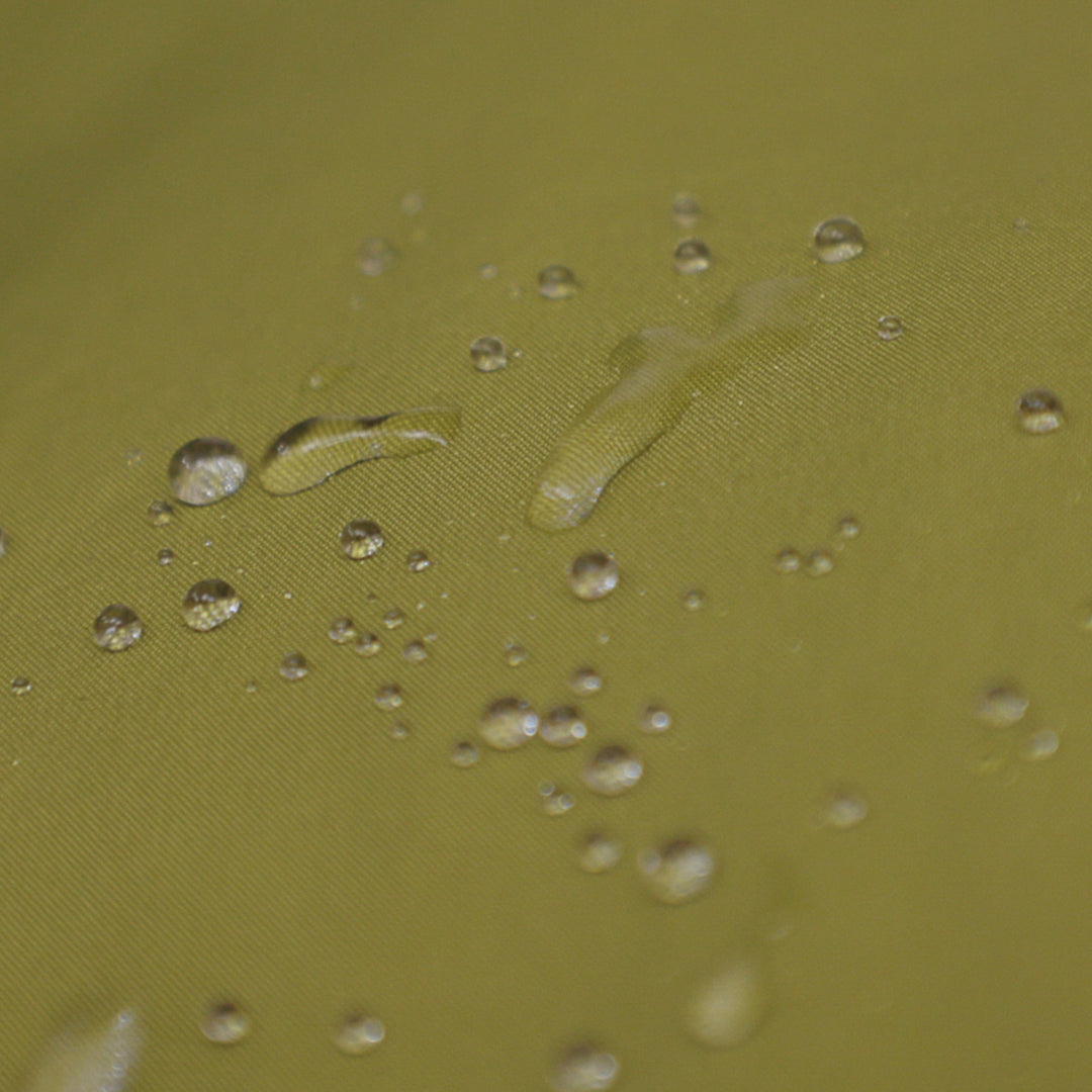 Gear Aid Revivex Wash-In Water Repellent shown in use