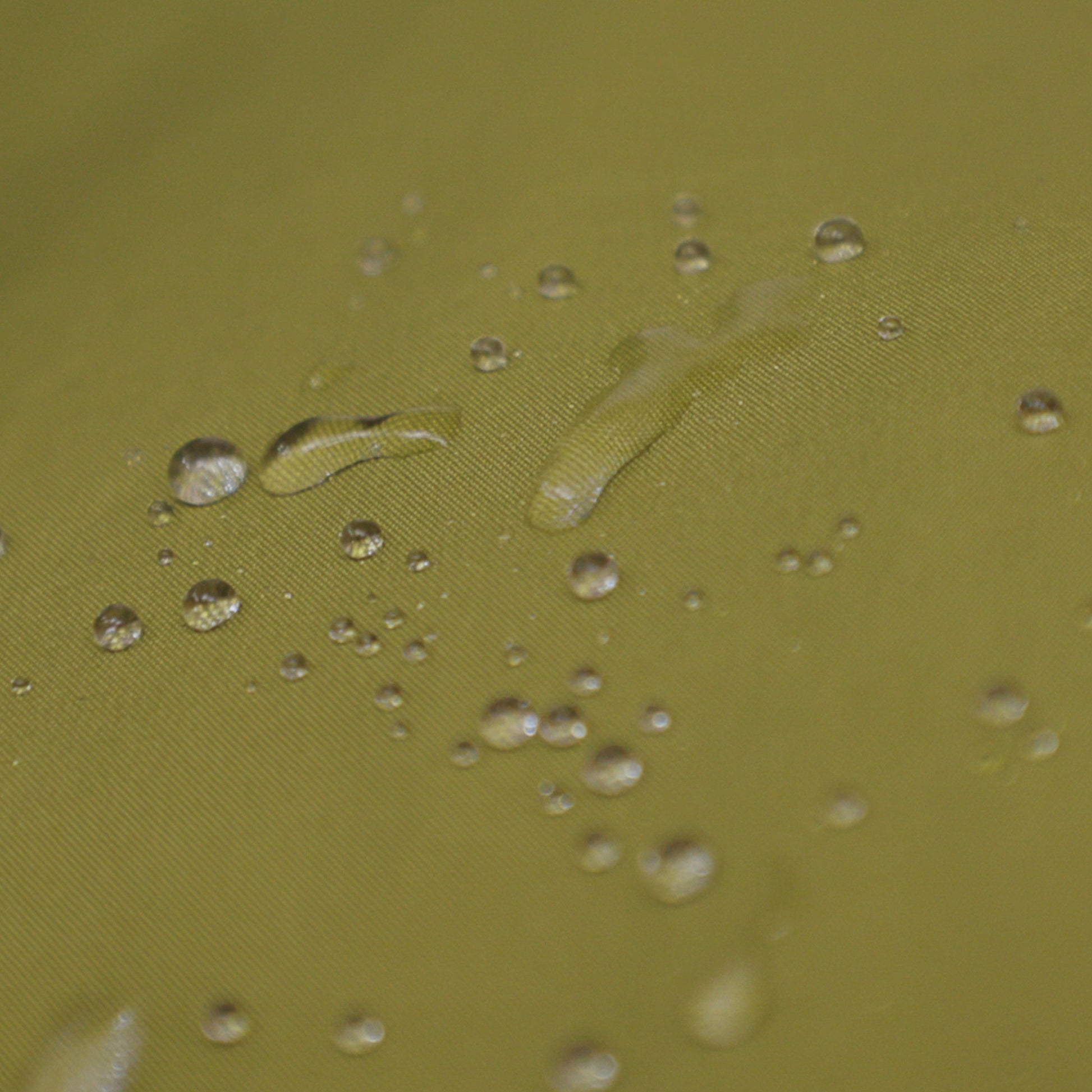 Gear Aid Revivex Wash-In Water Repellent shown in use