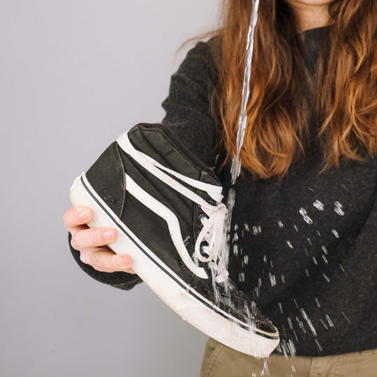Gear Aid Revivex Suede and Fabric Water Repellent shown in use