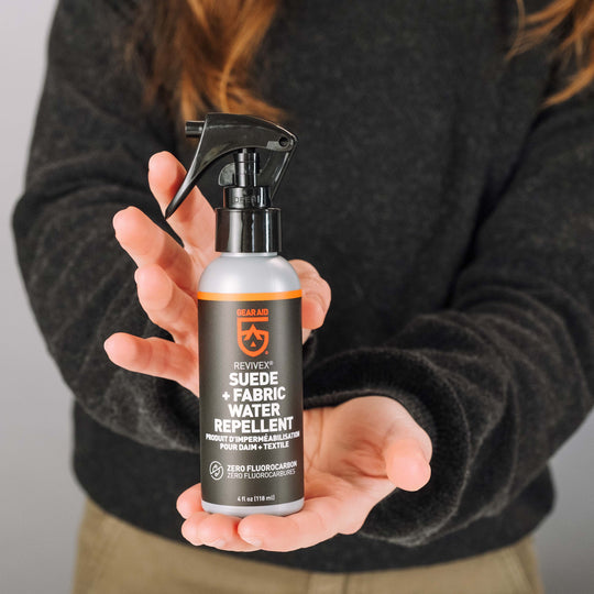 Gear Aid Revivex Suede and Fabric Water Repellent shown in use