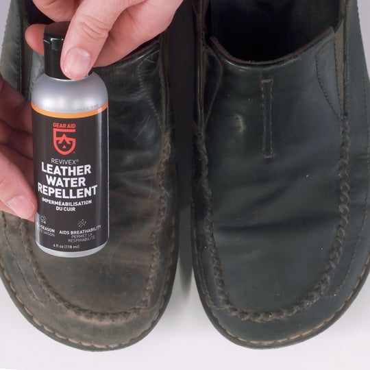 Gear Aid Revivex Leather Water Repellent shown in use