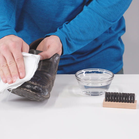 Gear Aid Revivex Leather Water Repellent shown in use