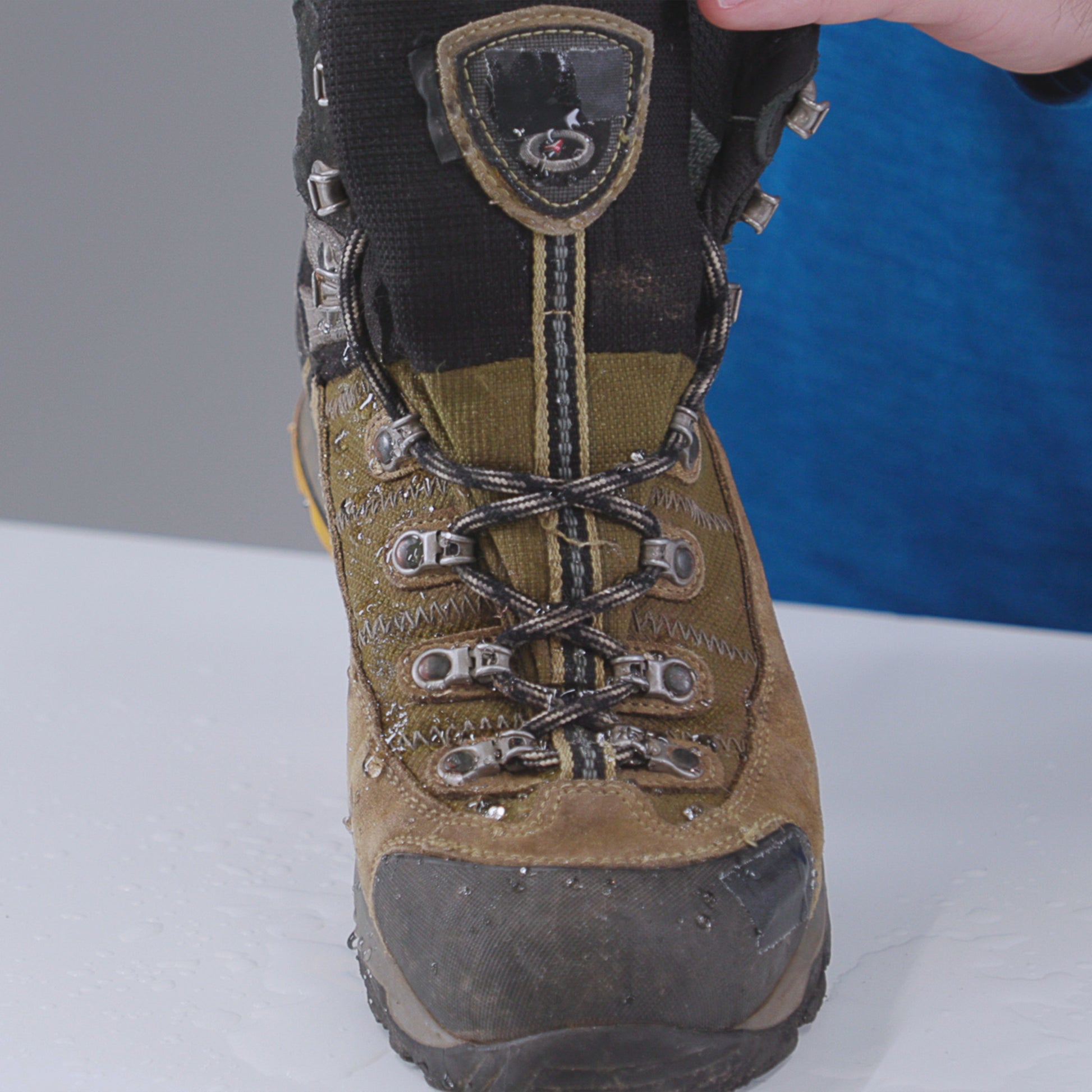 Gear Aid Revivex Suede and Fabric Water Repellent shown in use
