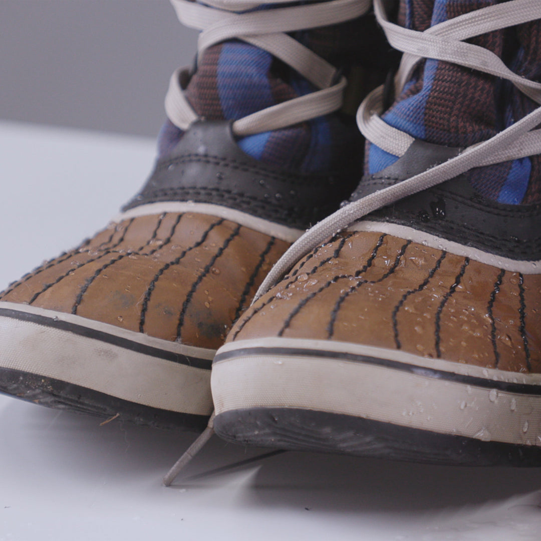 Gear Aid Revivex Suede and Fabric Water Repellent shown in use