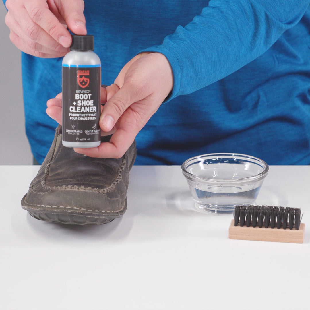 Gear Aid Revivex Leather Boot Care Kit shown in use