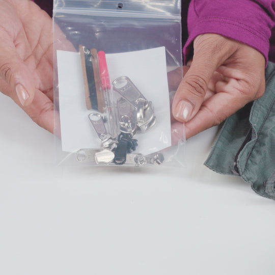 Gear Aid Zipper Repair Kit shown in use