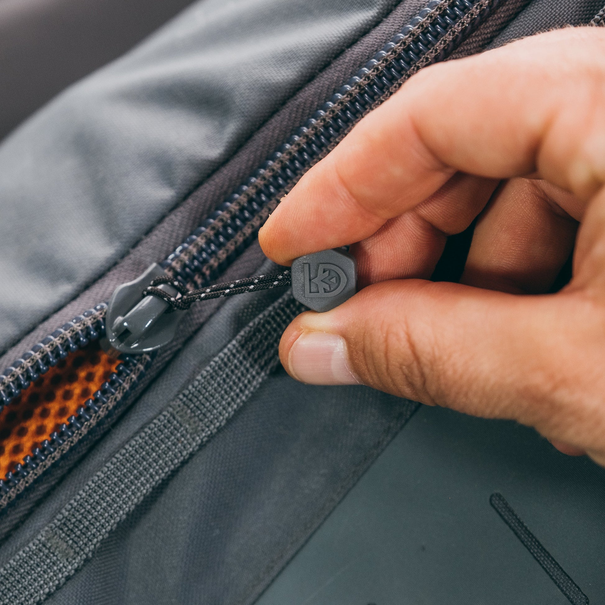 Gear Aid Zipper Pulls shown in use