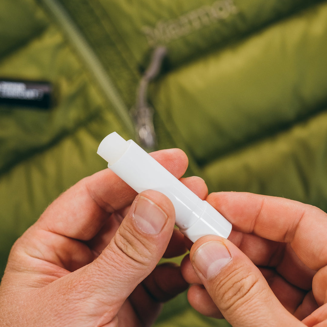 Gear Aid Zipper Lubricant Stick shown in use