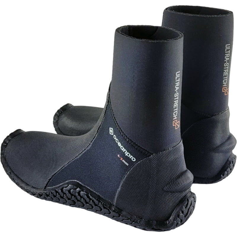 Rear three-quarter view of black Oceanpro Ultra Stretch 5/4mm zipless boots showing the heel panels and tall neoprene cuffs.