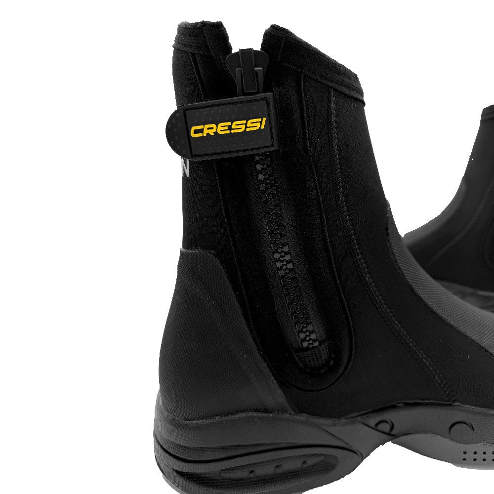 Close-up of a black Cressi Recon HD dive boot showing the side zipper and Cressi branding.