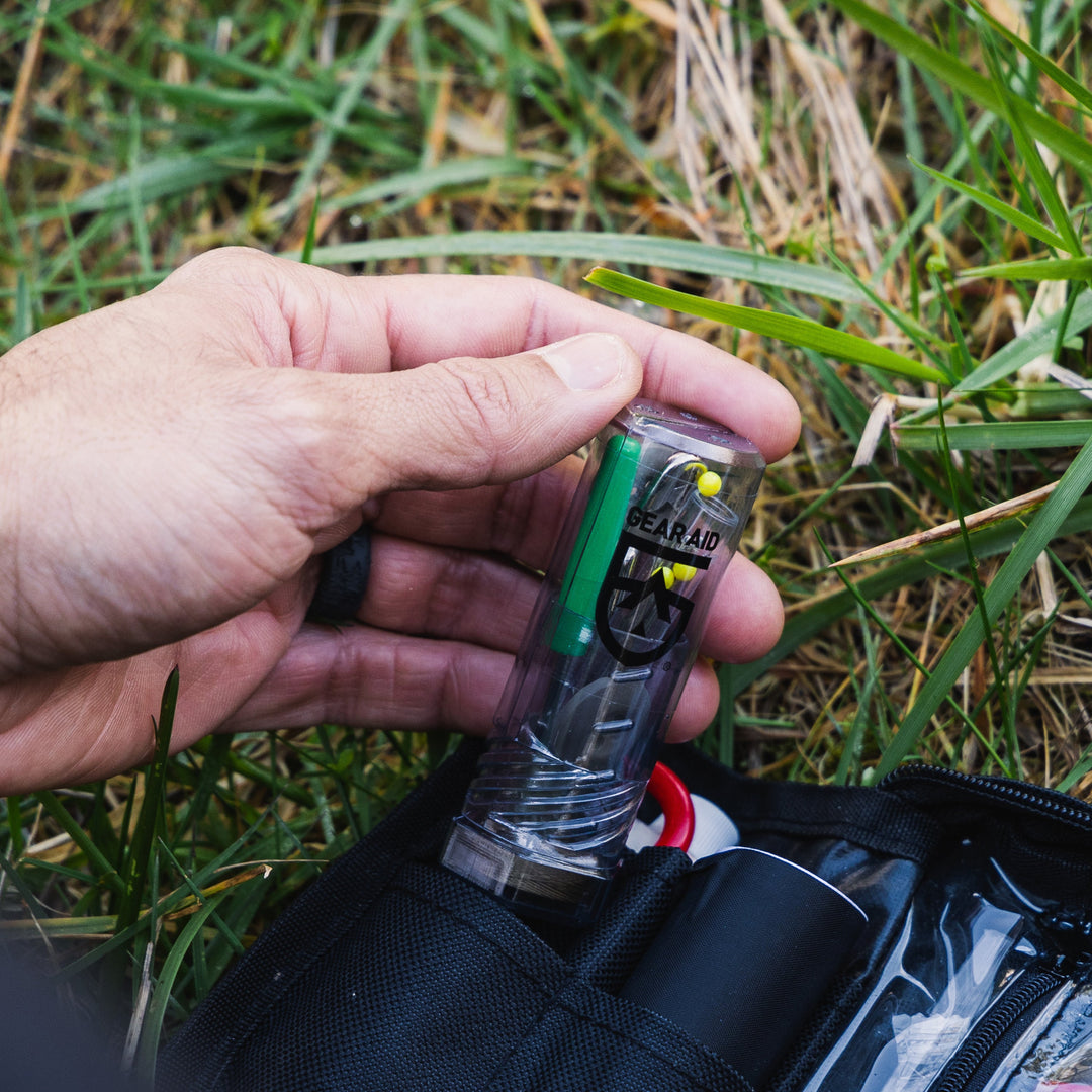 Gear Aid Sewing Kit shown in use