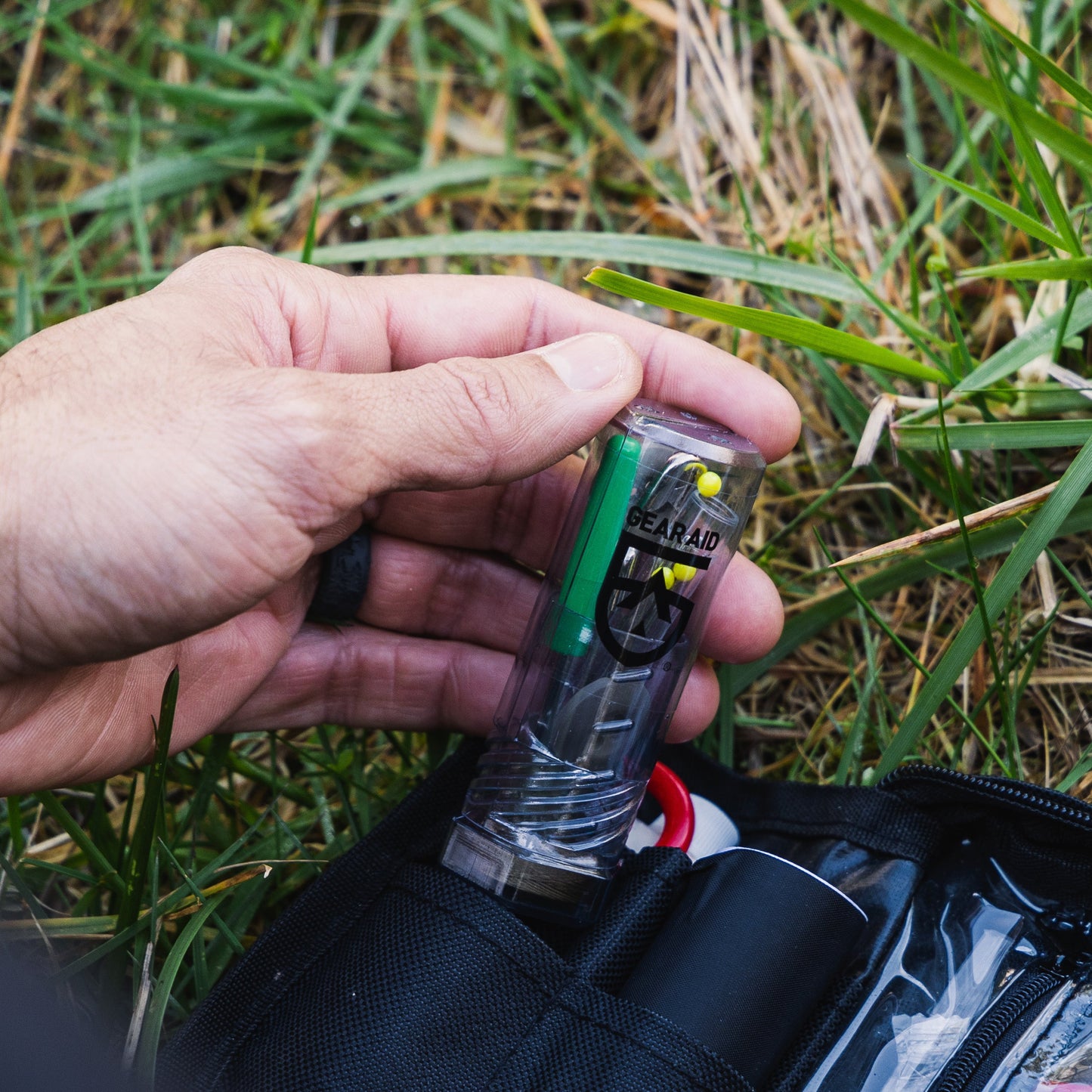 Gear Aid Sewing Kit shown in use