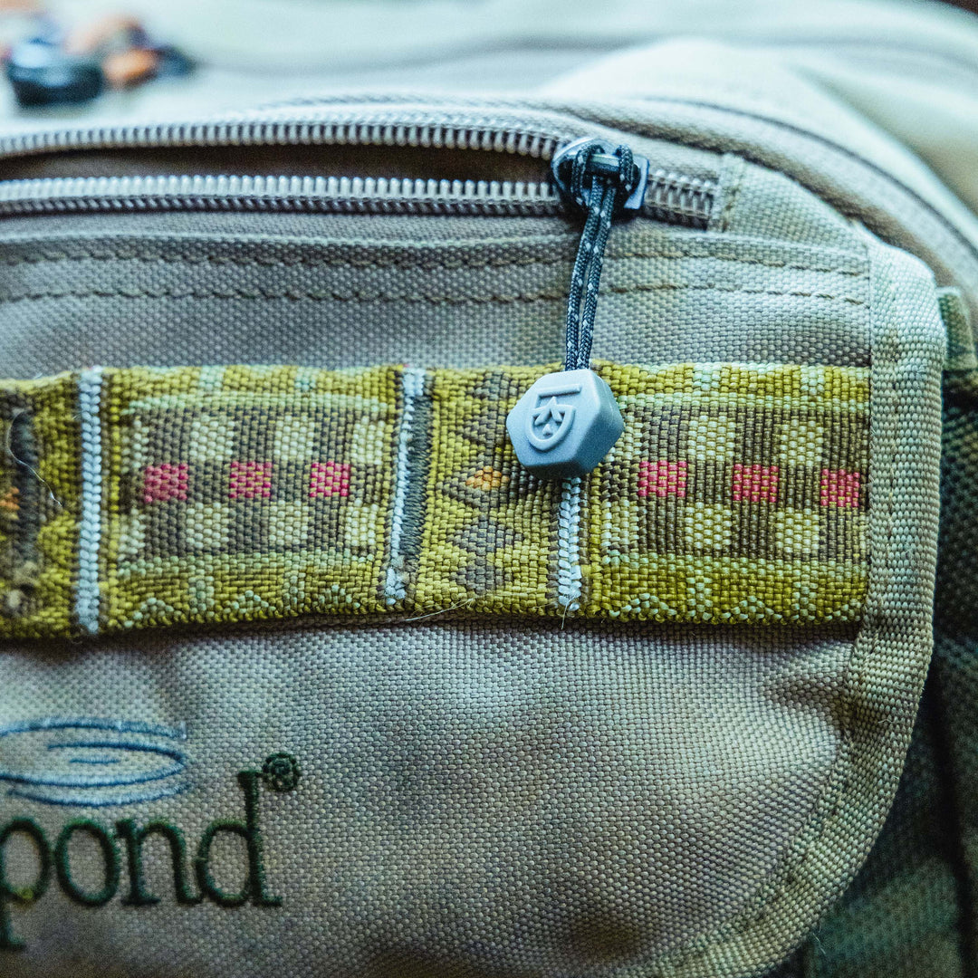 Gear Aid Zipper Pulls shown in use