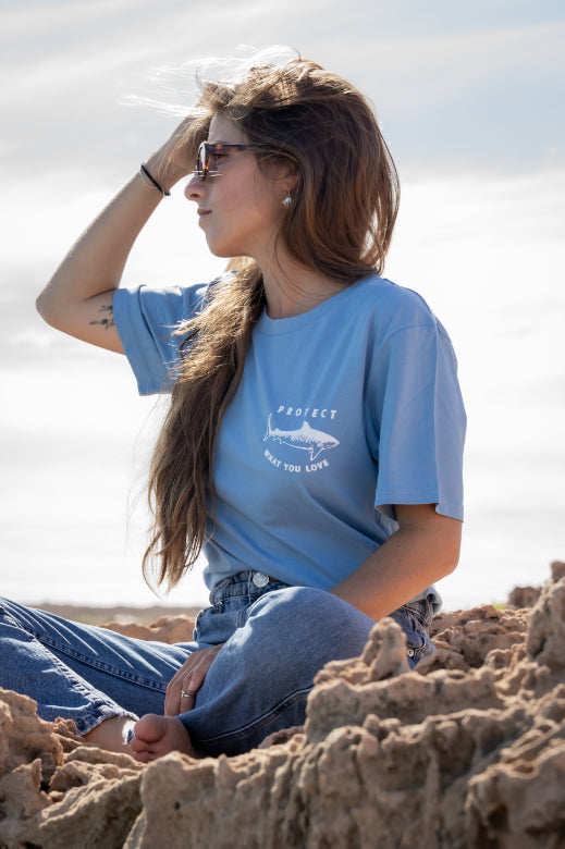 Protect What You Love Classic Tiger Shark Tee — Light Blue, worn front view