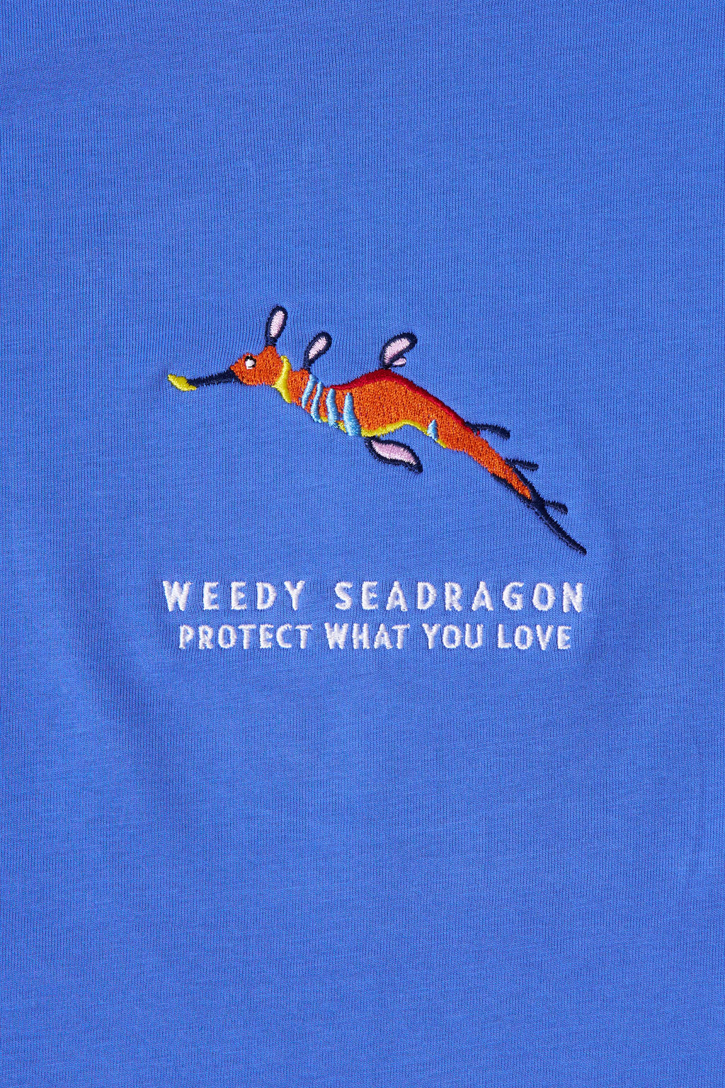Protect What You Love Weedy Seadragon Tee — Winter Blue embroidery detail