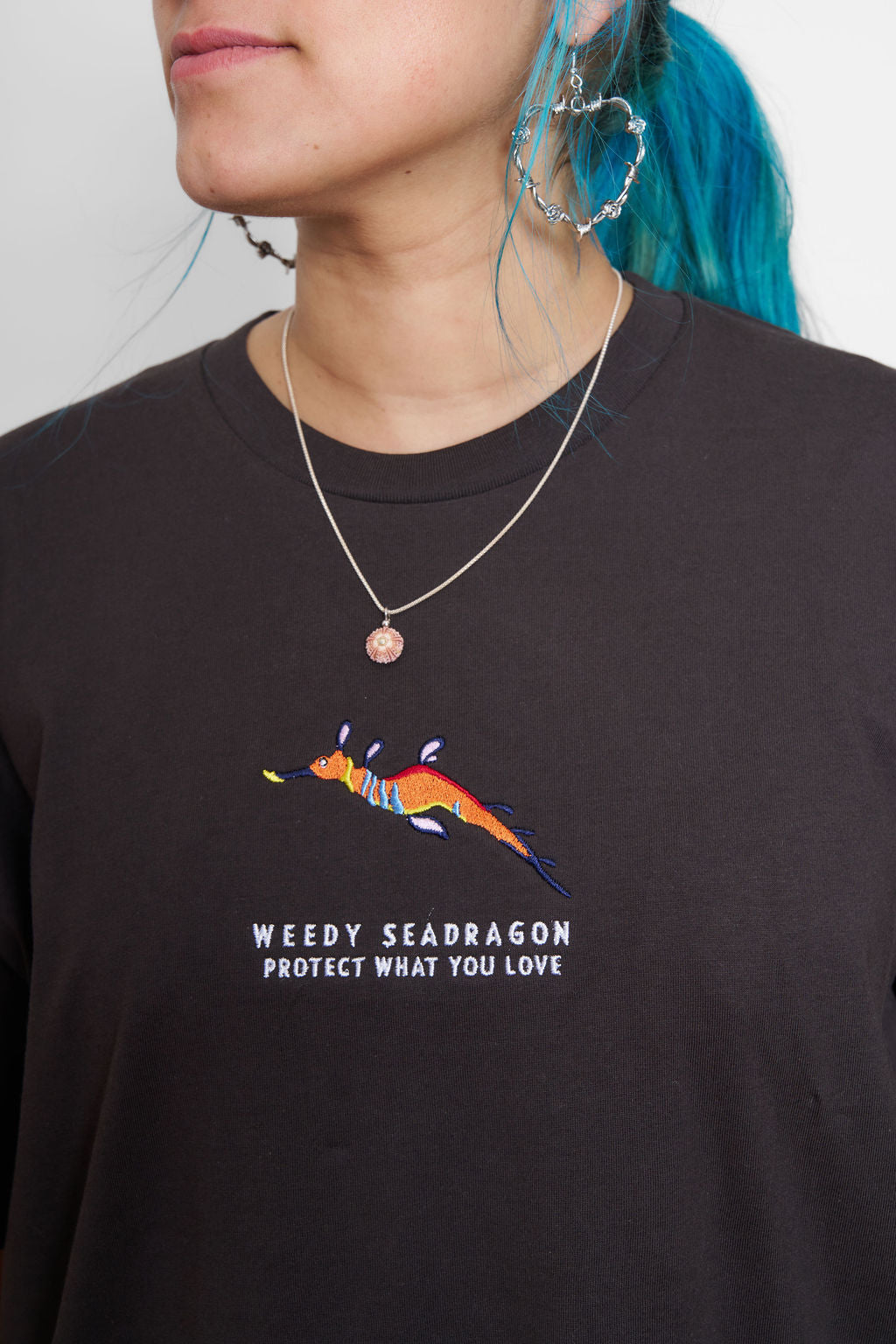 Protect What You Love Weedy Seadragon Tee — Charcoal, worn front detail